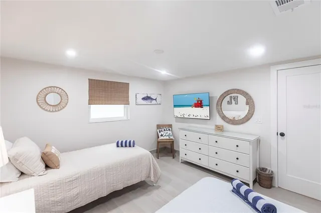 a bedroom with a bed and a closet