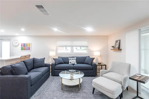 a living room with furniture and a couch