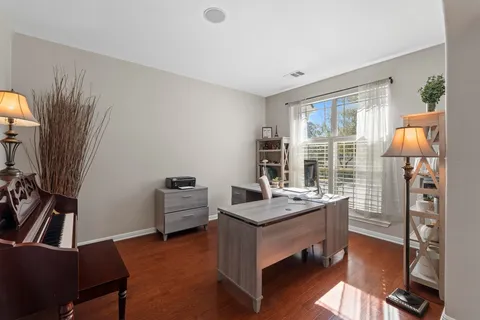 a room with furniture and a window