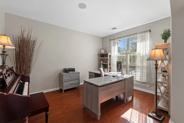 a room with furniture and a window