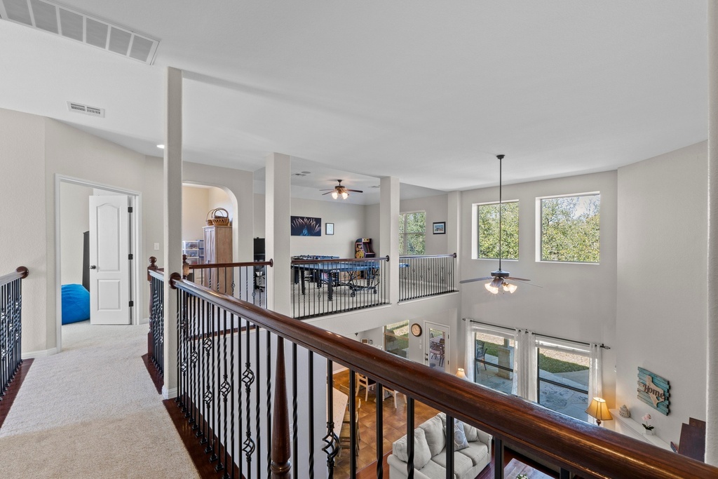 15104 Spillman Ranch Loop Austin, TX 78738 - Photo 16 of 31 a view of a city from a balcony