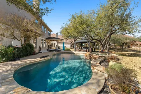 a view of a house with swimming pool