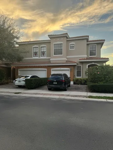 a view of a car parked in front of a building