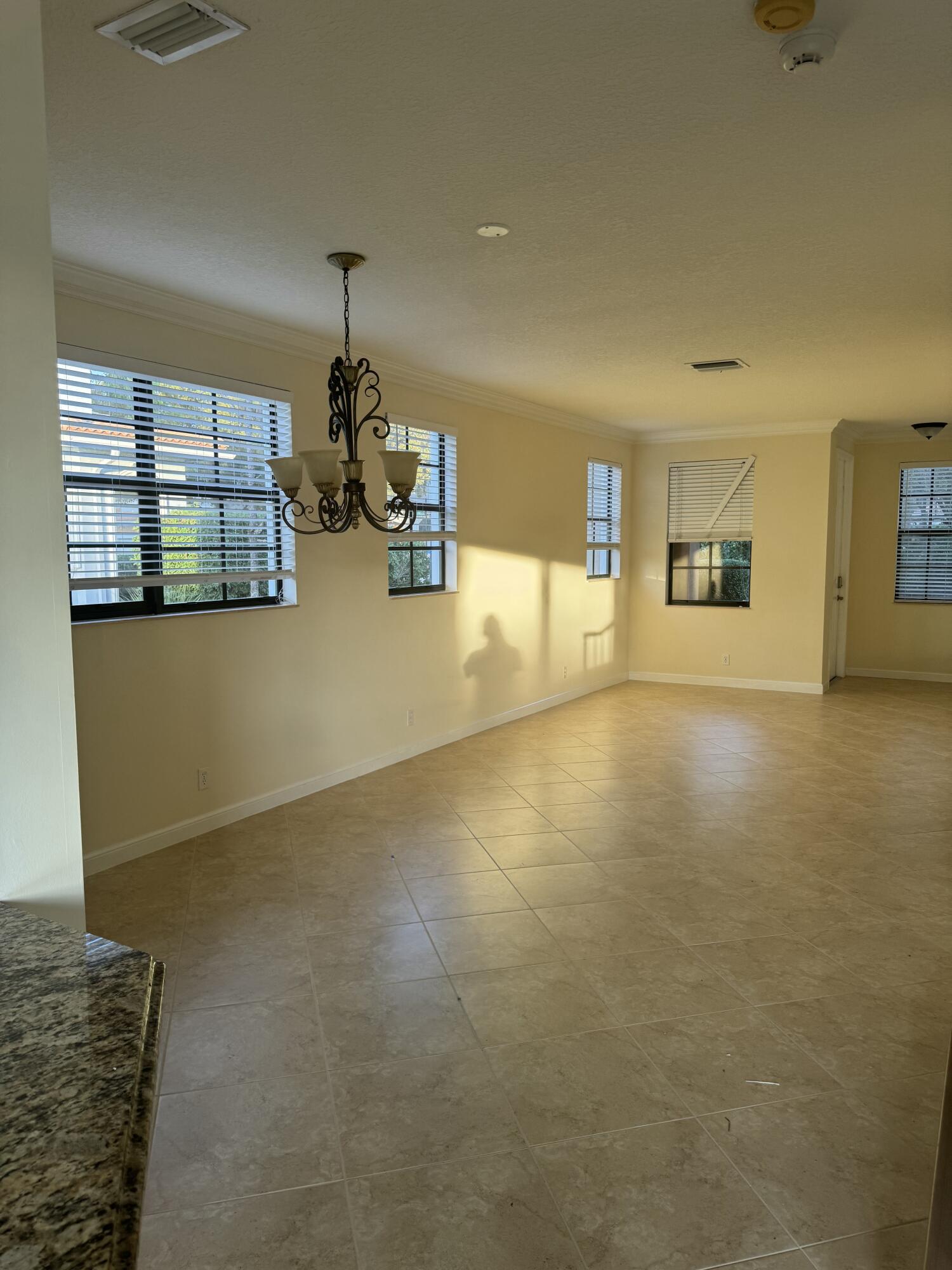 168 Astor Circle Delray Beach, FL 33484 - Photo 2 of 18 a view of livingroom with window