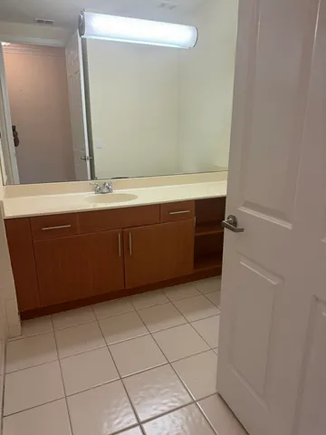 a bathroom with a bathtub and a sink