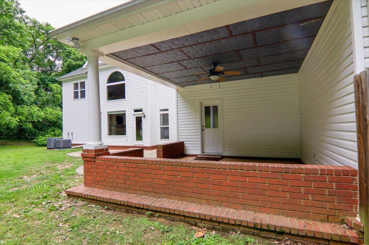 343 Cullum Road Munford, TN 38058 - Photo 25 of 25 The back has a covered patio and open patio. There is plenty of room for a pool.