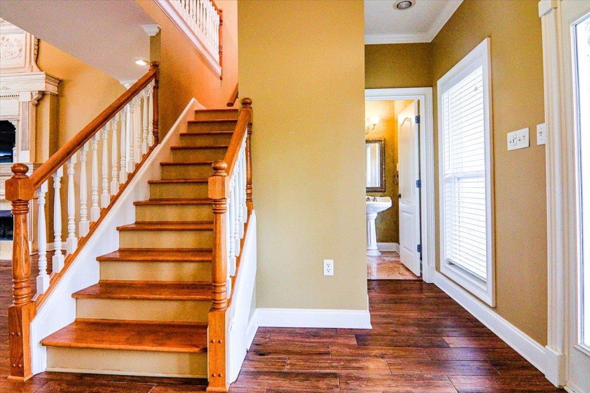 Enter from front door.  Half bath is to the right.