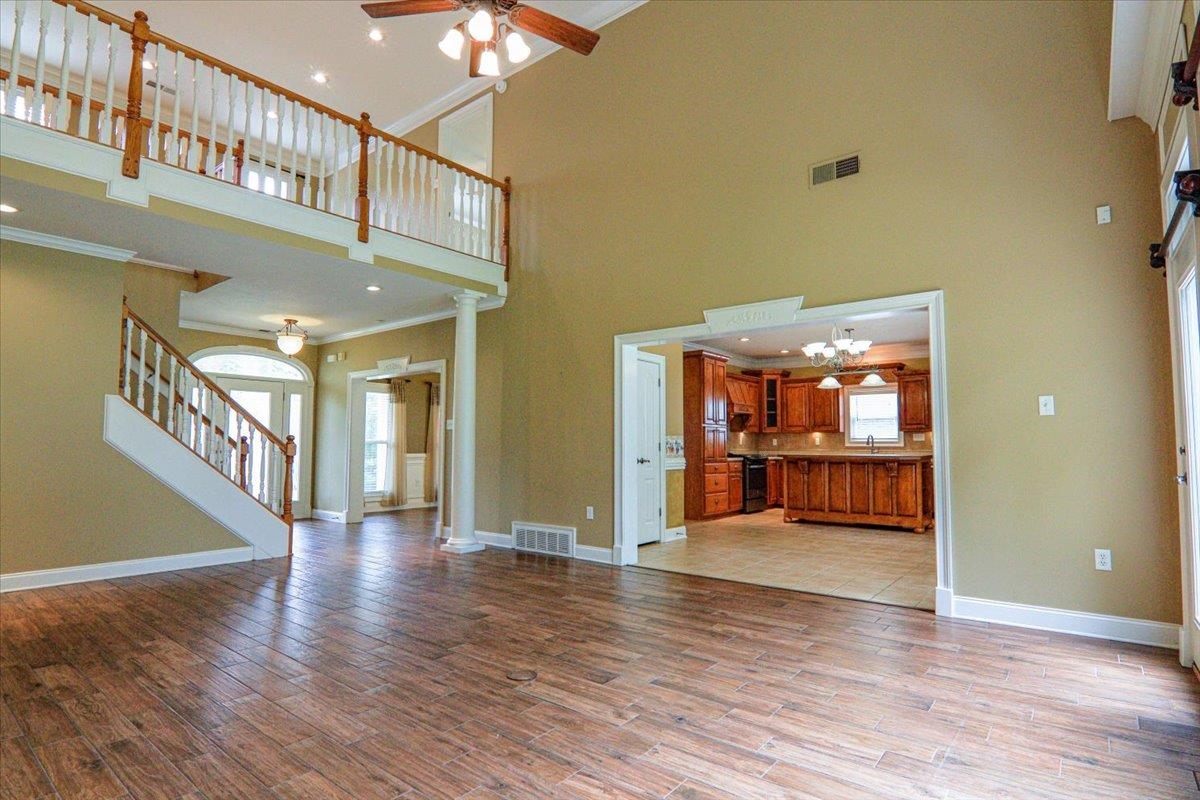 343 Cullum Road Munford, TN 38058 - Photo 8 of 25 This flooring is porcelain tile throughout great room, dining room and primary bedroom.