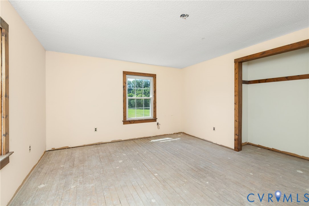 26081 Mason Road Jarratt, VA 23867 - Photo 18 of 49 Room featuring exposed subflooring, light-toned wa