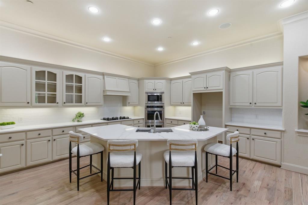 30 Piazza Lane Colleyville, TX 76034 - Photo 10 of 39 Double ovens, gas range, updated finishes and fresh paint