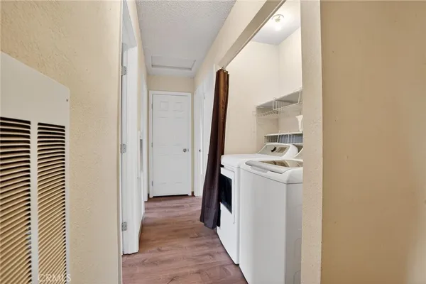 a view of a utility room with washer and dryer