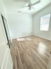 view of an empty room with a window