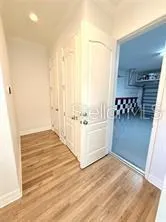 a view of a swimming pool and lounge chair