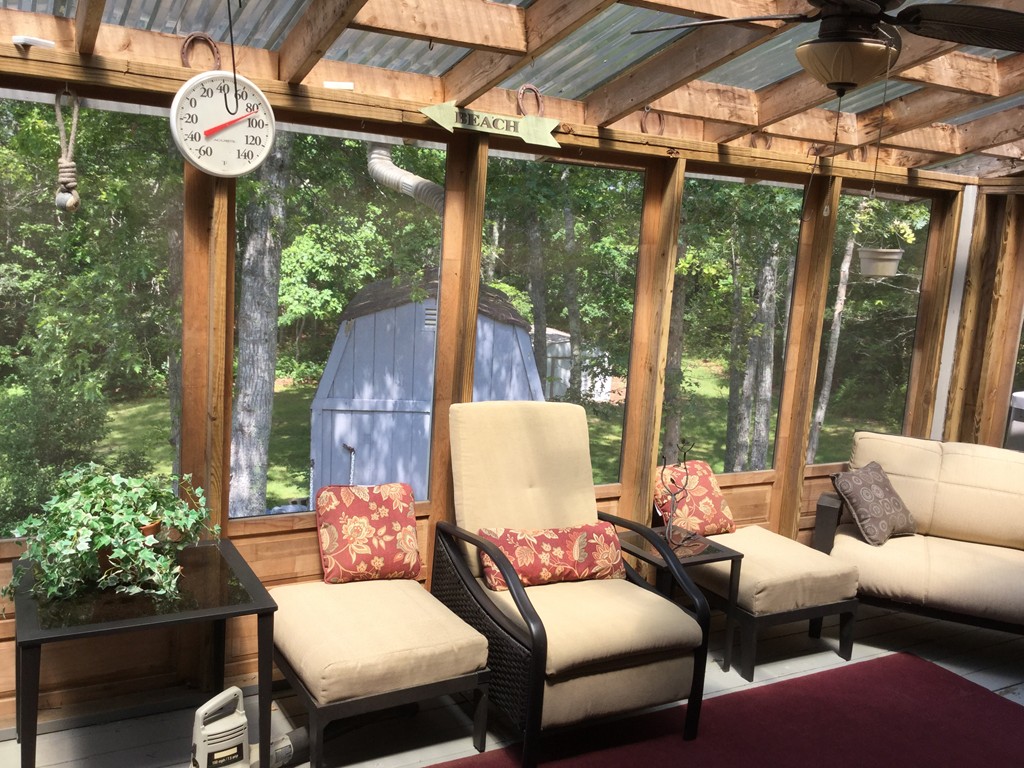 28 Deerfield Road Mashpee, MA 02649 - Photo 12 of 19 a outdoor living space with furniture and garden view