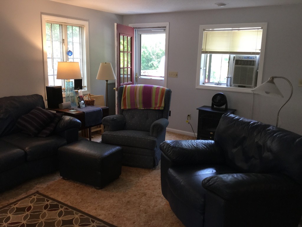 28 Deerfield Road Mashpee, MA 02649 - Photo 17 of 19 a living room with furniture and a window