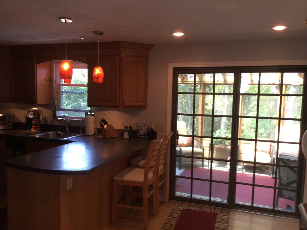 28 Deerfield Road Mashpee, MA 02649 - Photo 8 of 19 a kitchen with a sink and a large window