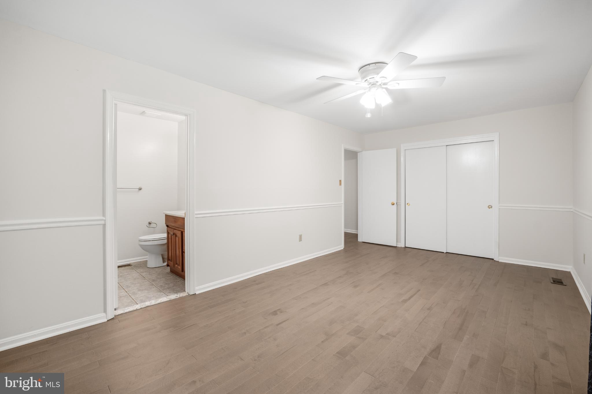 11521 Shell Flower Lane Columbia, MD 21044 - Photo 14 of 31 an empty room with fan and entryway