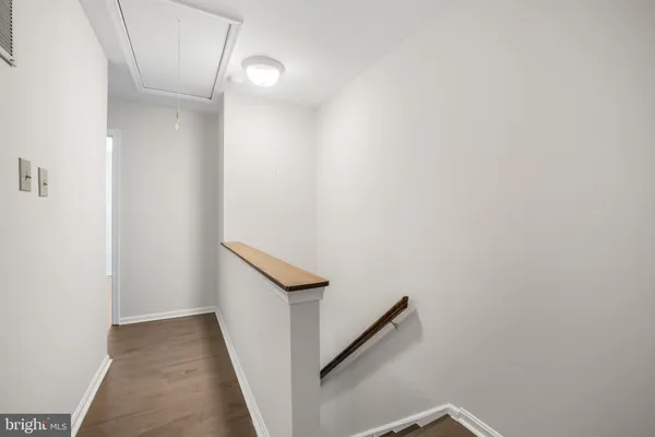 a view of a hallway with staircase