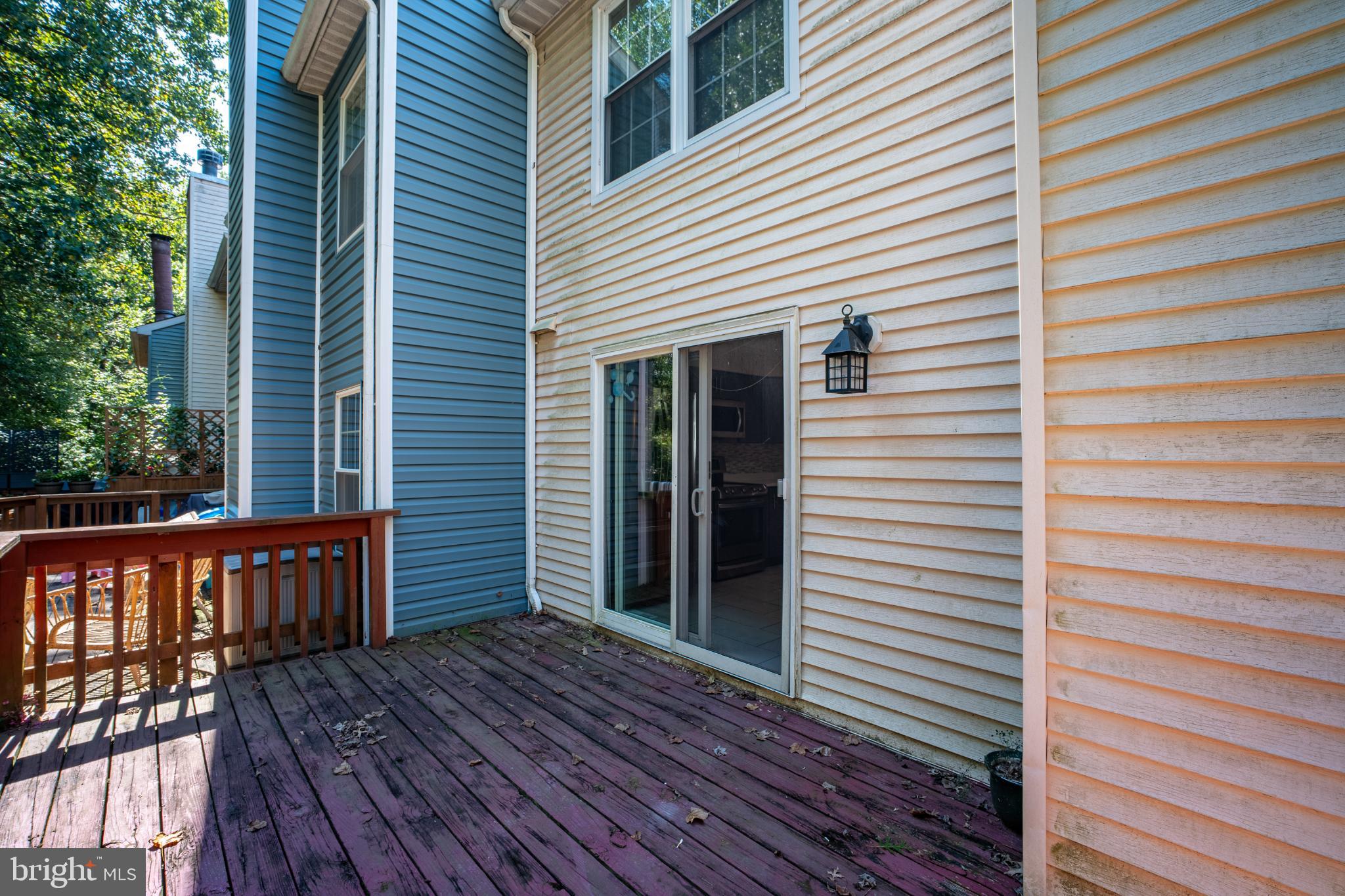 11521 Shell Flower Lane Columbia, MD 21044 - Photo 24 of 31 a view of a balcony with wooden floor