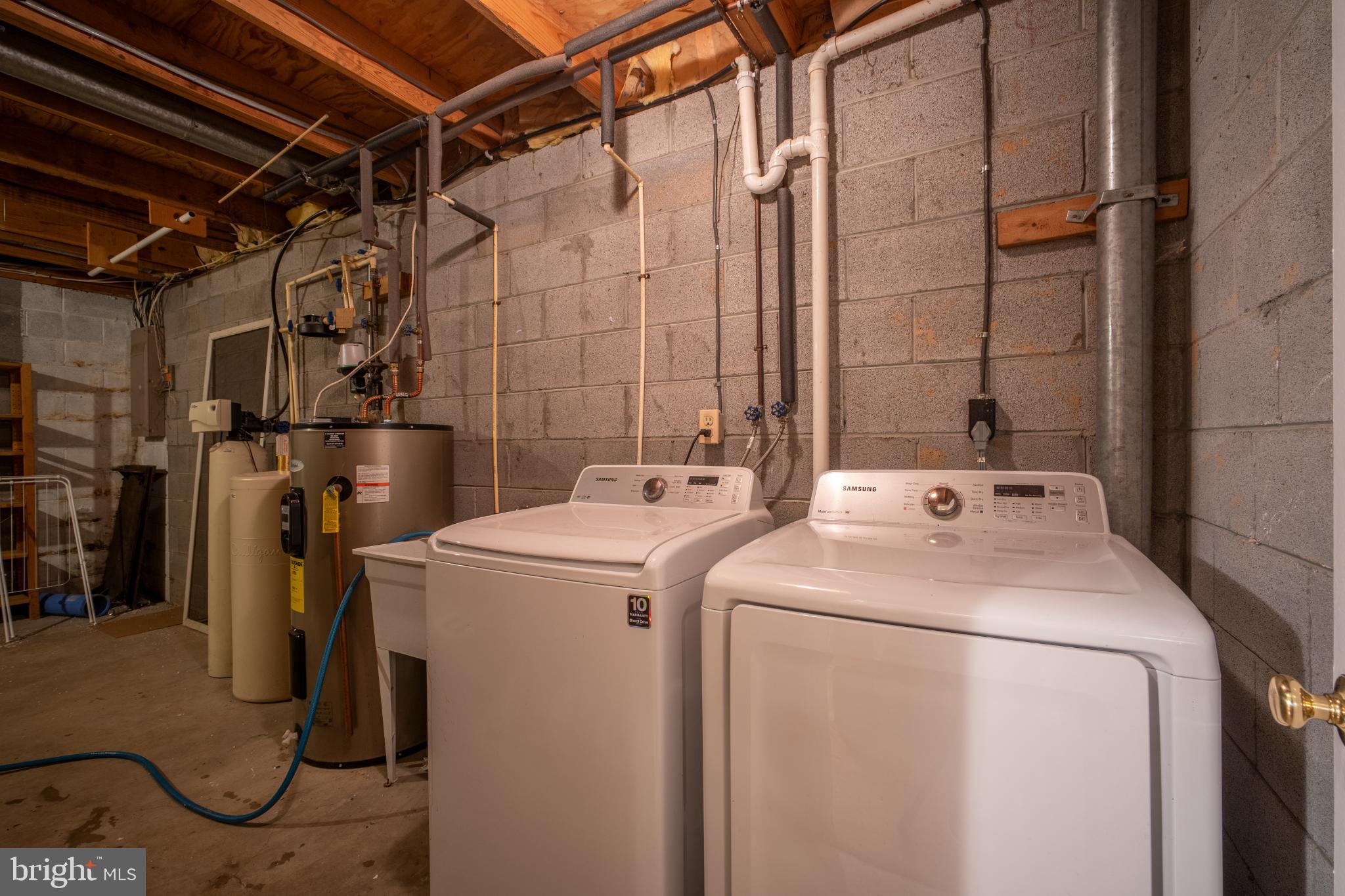 11521 Shell Flower Lane Columbia, MD 21044 - Photo 27 of 31 a utility room with dryer and washer