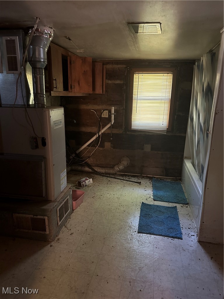 37114 Barber Ridge Road Woodsfield, OH 43793 - Photo 11 of 50 Kitchen with tile patterned floors and brown cabinetry
