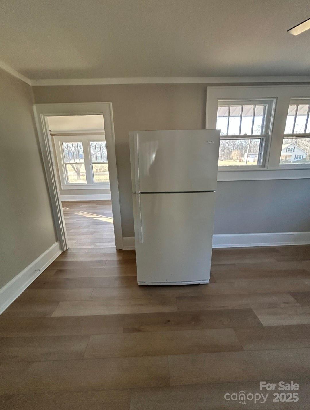 36040 Palestine Road Albemarle, NC 28001 - Photo 11 of 43 a white refrigerator freezer sitting in a kitchen