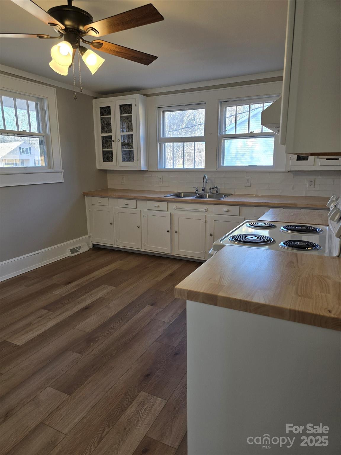 36040 Palestine Road Albemarle, NC 28001 - Photo 12 of 43 a kitchen with a cabinets appliances and a window