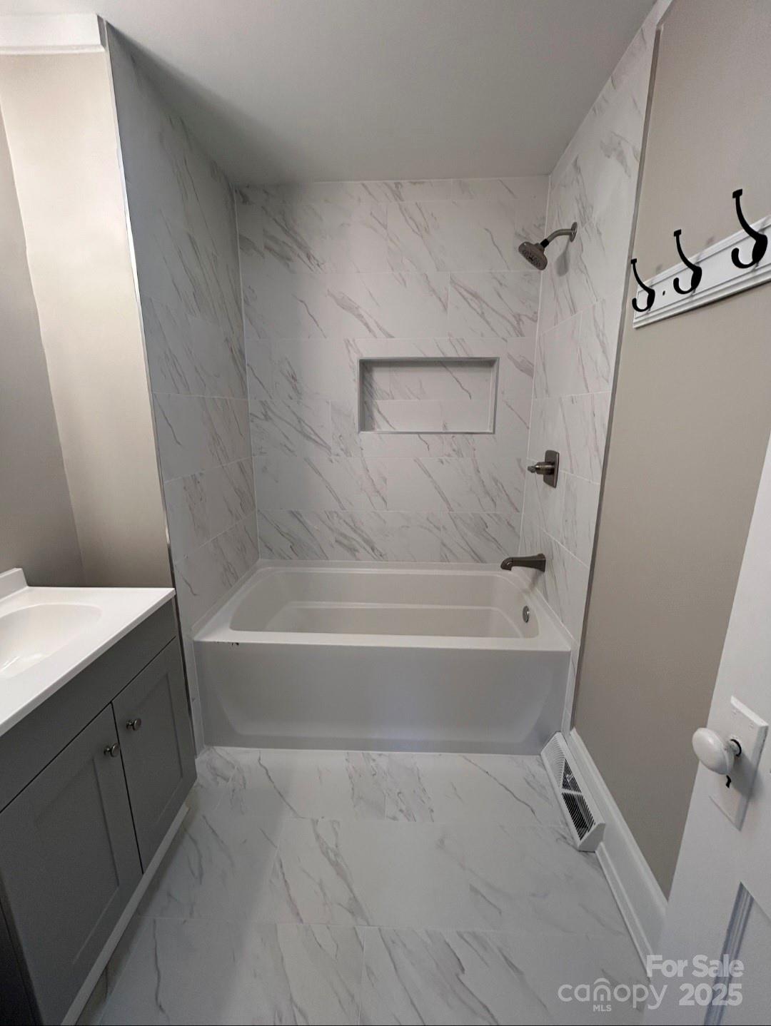 36040 Palestine Road Albemarle, NC 28001 - Photo 24 of 43 a bathroom with a bathtub and a shower