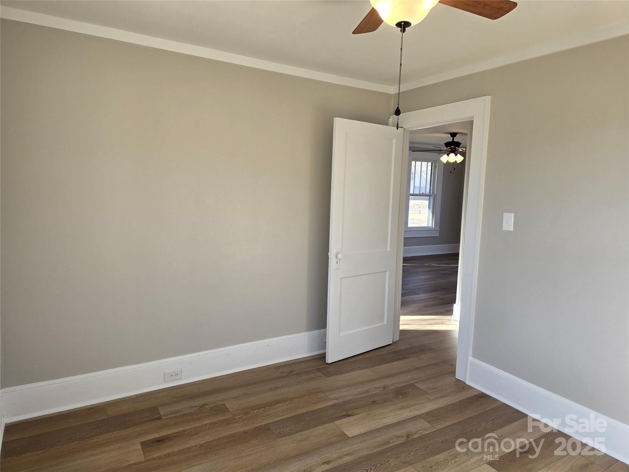 36040 Palestine Road Albemarle, NC 28001 - Photo 28 of 43 a view of a room with wooden floor fan and a window