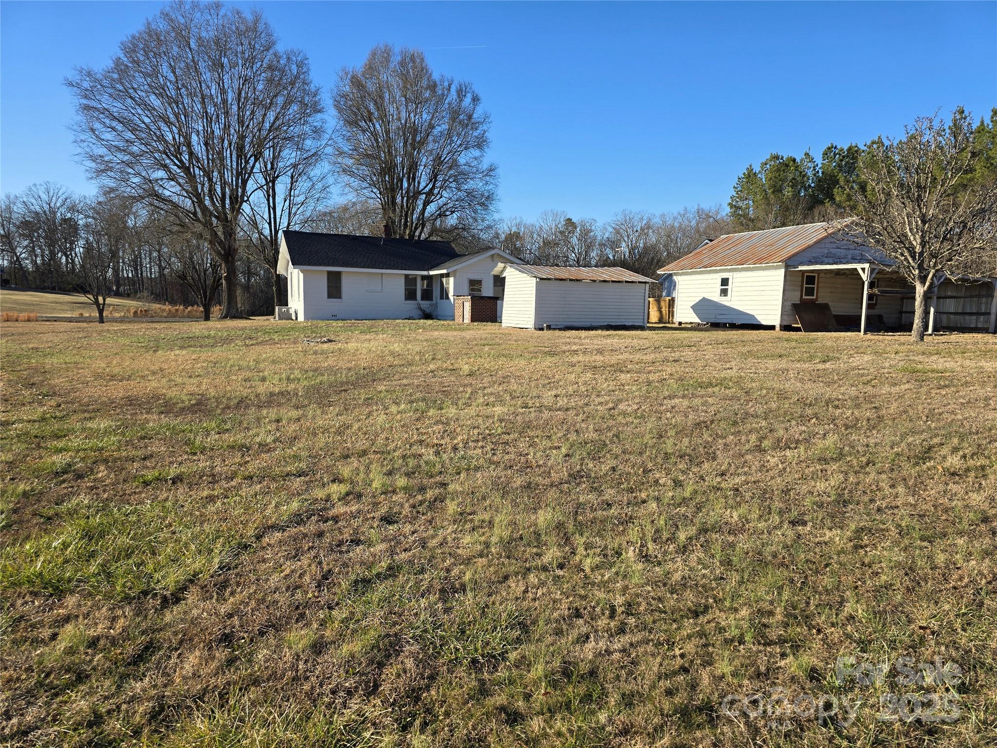 36040 Palestine Road Albemarle, NC 28001 - Photo 32 of 43 a front view of a house with a yard