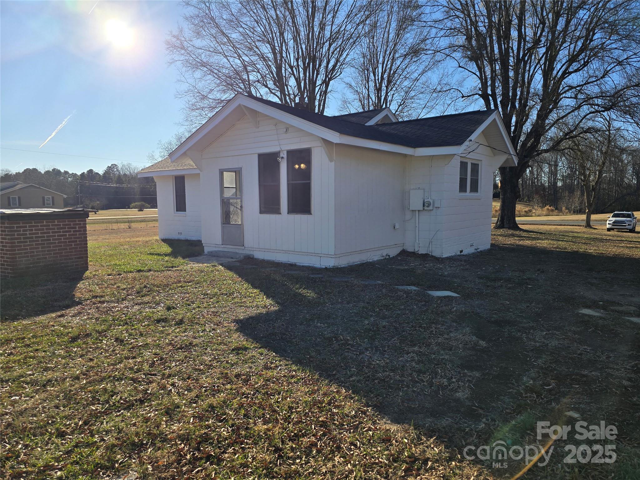 36040 Palestine Road Albemarle, NC 28001 - Photo 42 of 43 a front view of a house with a yard