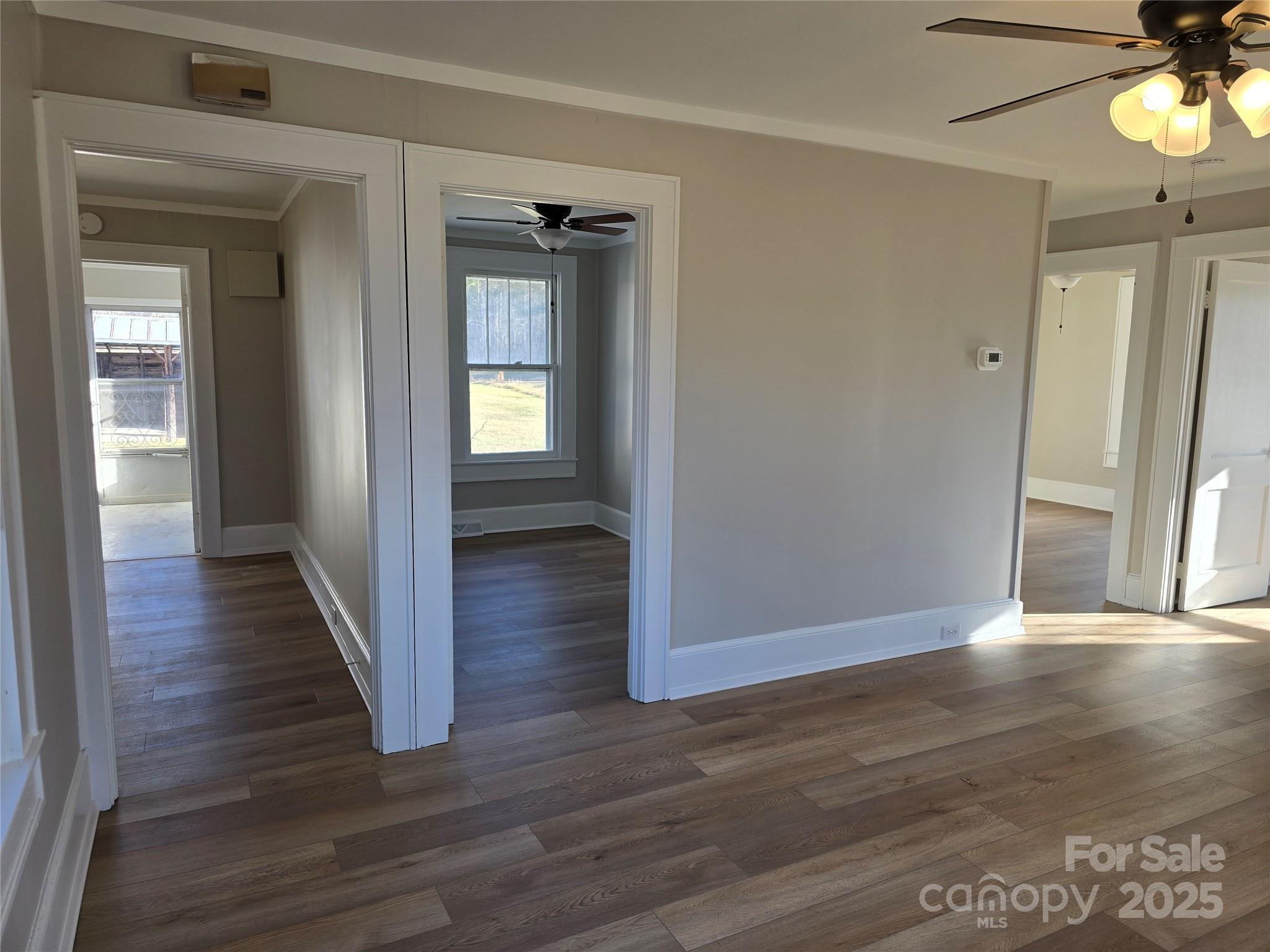 36040 Palestine Road Albemarle, NC 28001 - Photo 9 of 43 a view of a hallway with wooden floor