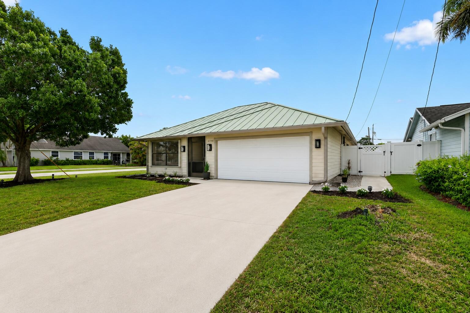 6208 Michael Street Jupiter, FL 33458 - Photo 53 of 60 Front Of home 2