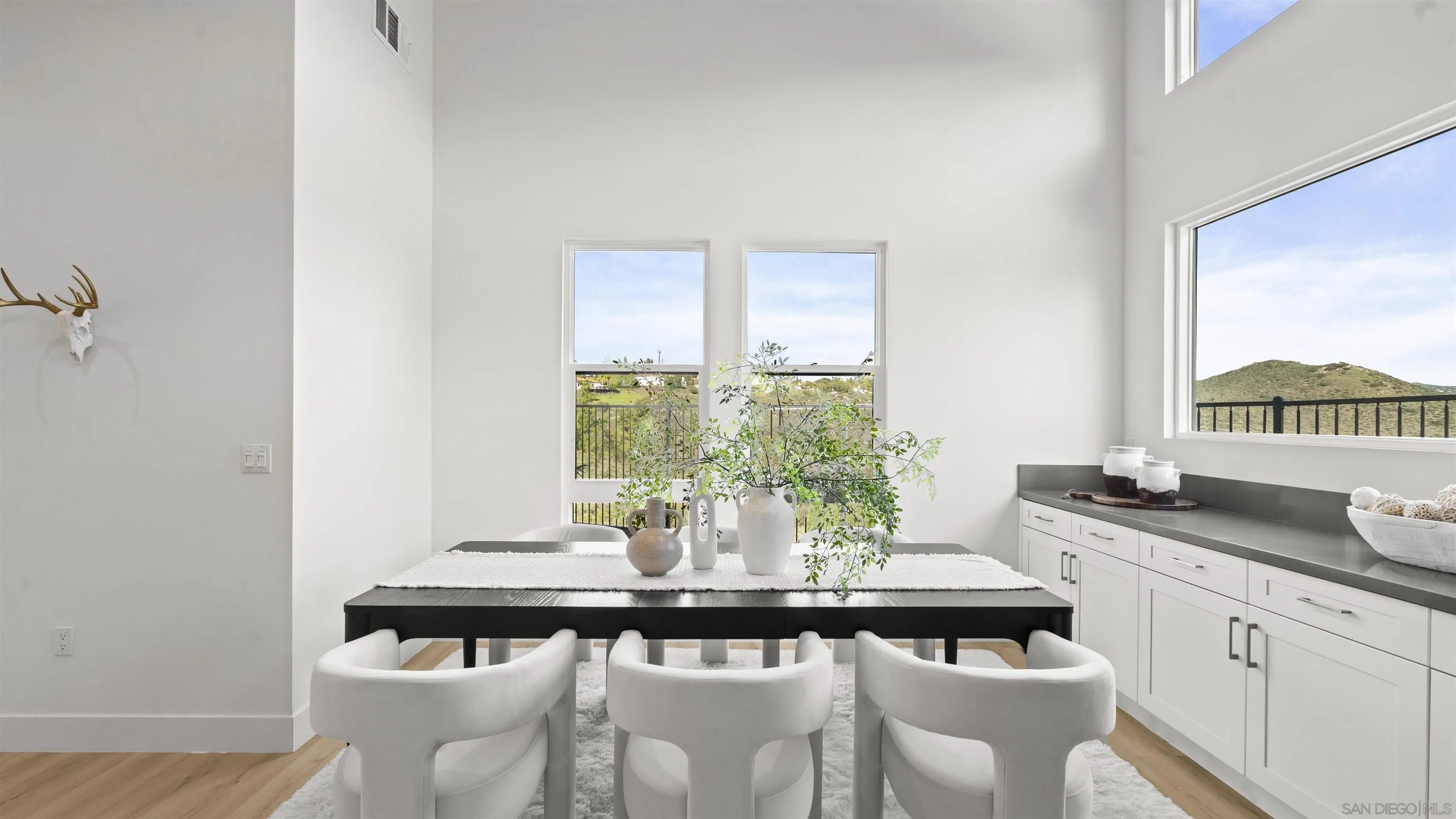 16925 Old Coach Road Poway, CA 92064 - Photo 16 of 53 a dining room with furniture and window