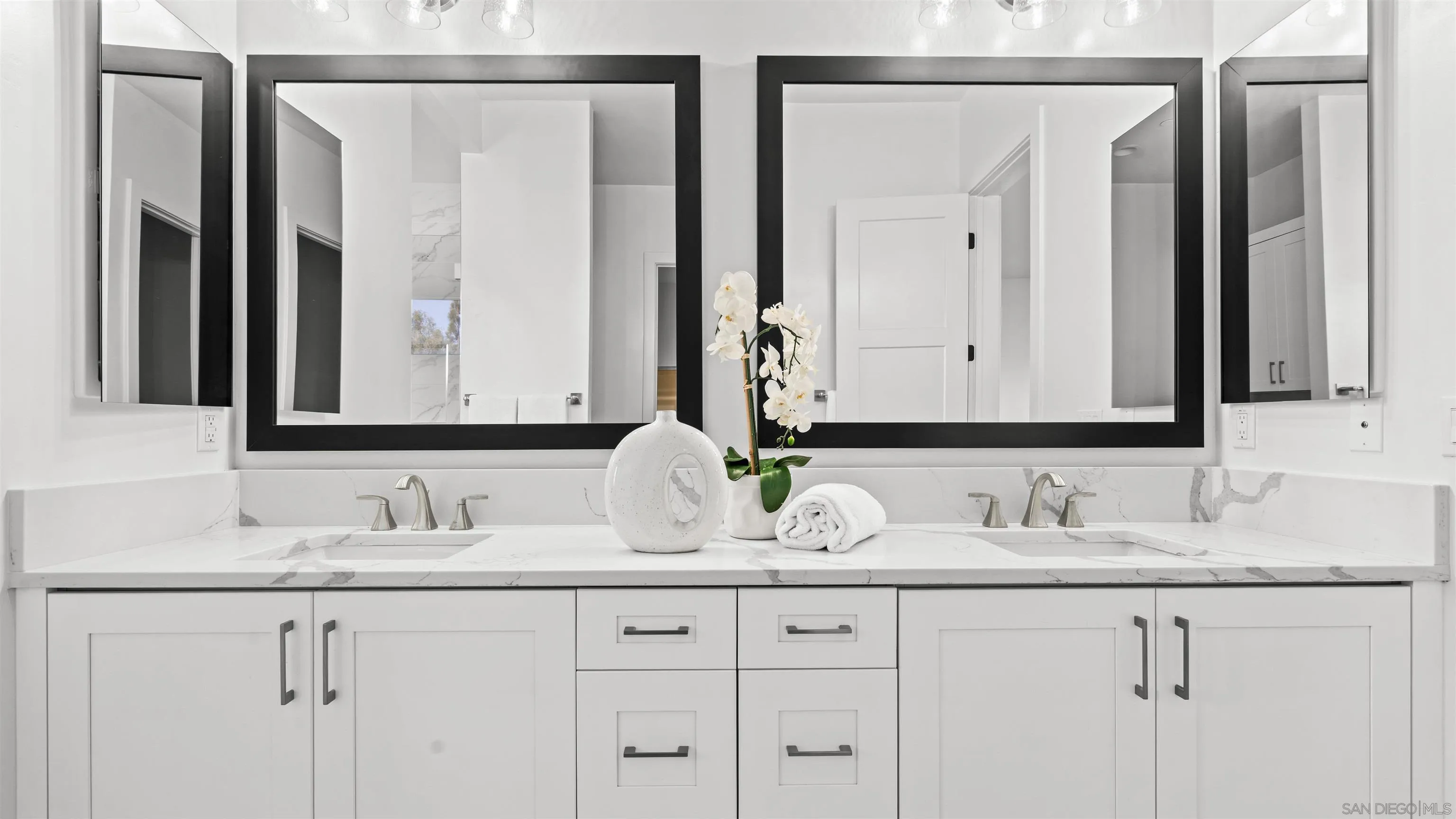 16925 Old Coach Road Poway, CA 92064 - Photo 22 of 53 a bathroom with double sink and a mirror