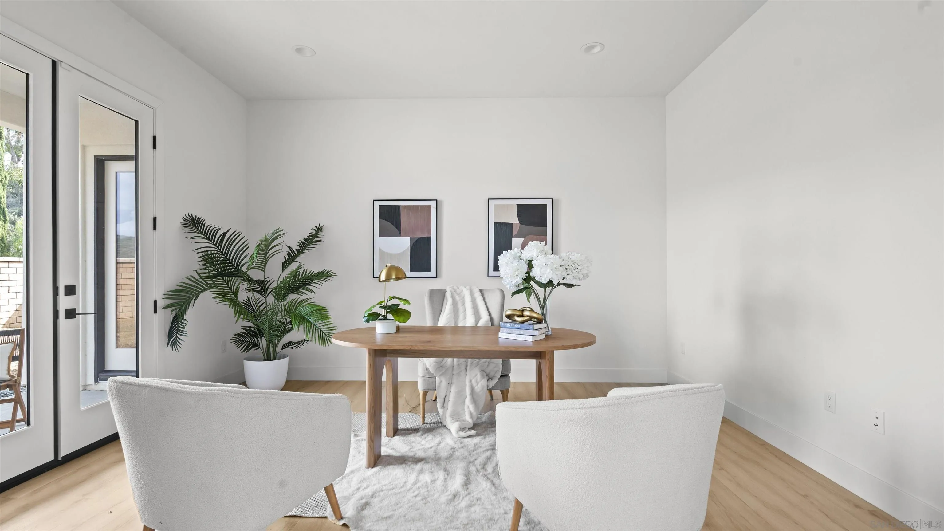 16925 Old Coach Road Poway, CA 92064 - Photo 25 of 53 a living room with furniture potted plant and a window