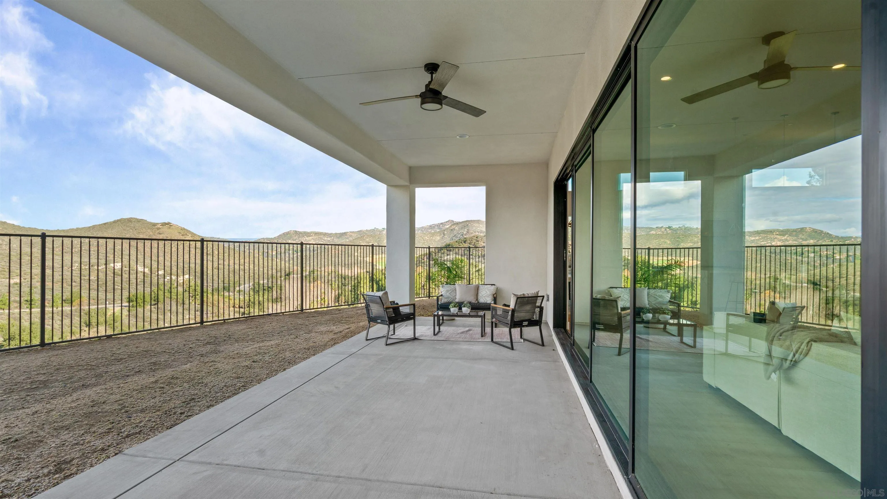 16925 Old Coach Road Poway, CA 92064 - Photo 47 of 53 a living room with hardwood floor and a balcony