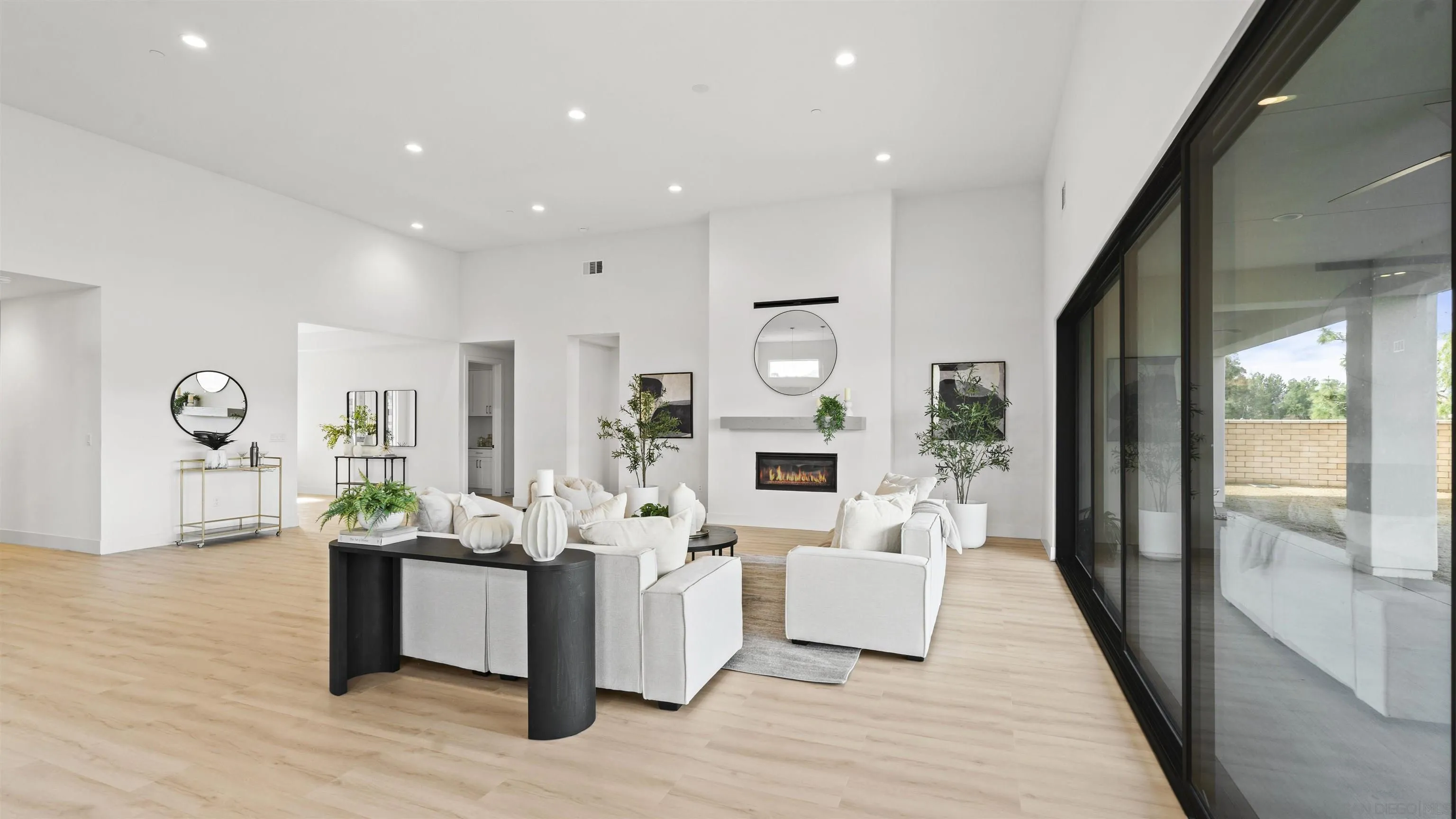 16925 Old Coach Road Poway, CA 92064 - Photo 9 of 53 a living room with fireplace furniture and a large window