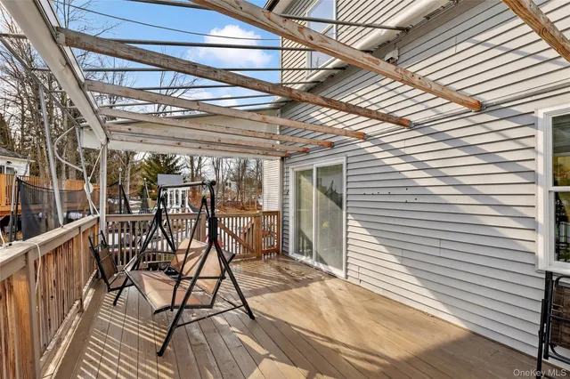 a bathroom with a sink mirror toilet and bathtub
