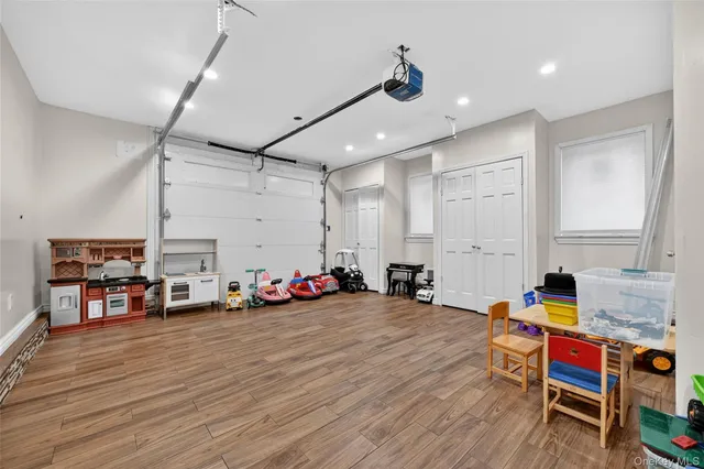 a view of a room with wooden floor and toys