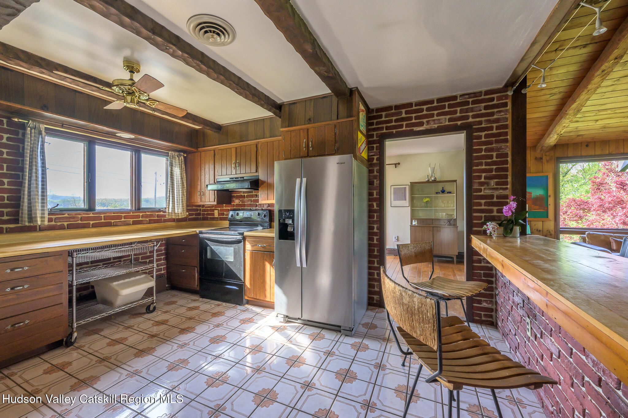 29 Edgemere Hill Road Catskill, NY 12414 - Photo 12 of 38 a kitchen with granite countertop a sink a counter top space appliances and cabinets