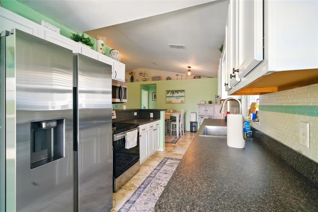 3312 Holly Springs Drive Hernando Beach, FL 34607 - Photo 16 of 42 a kitchen with lots of counter top space