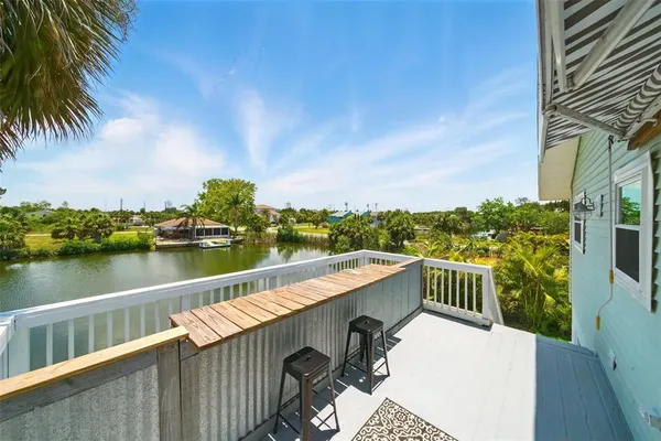 a view of a lake with a deck