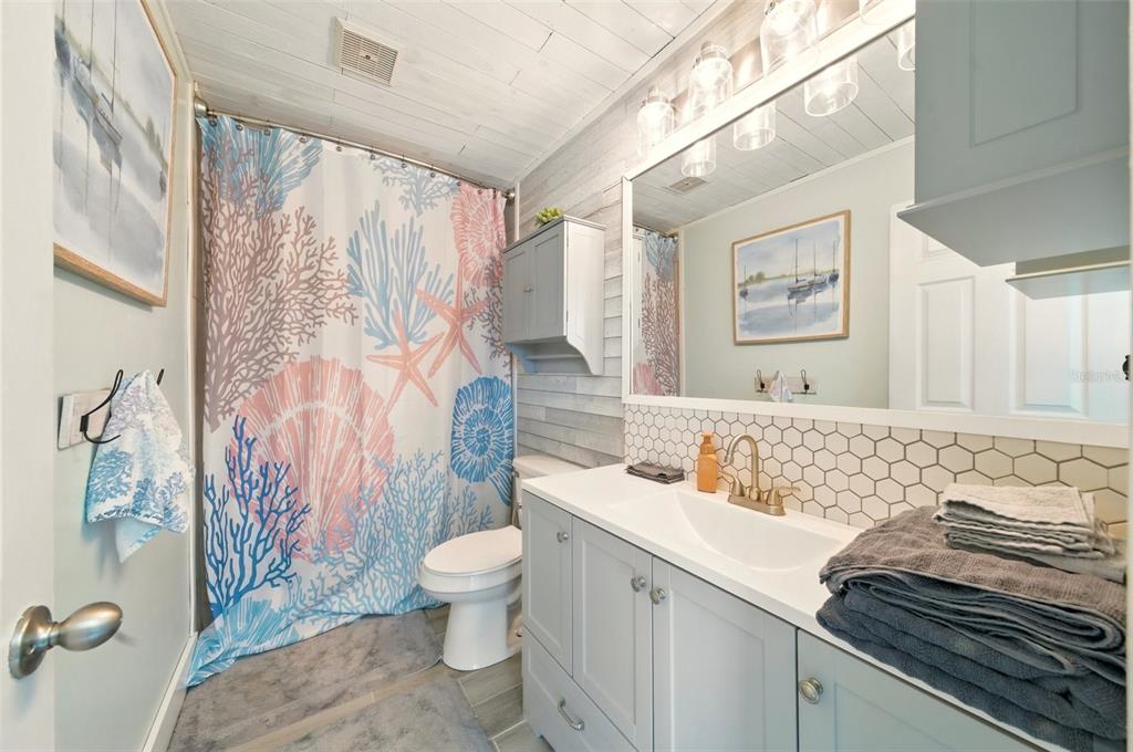 3312 Holly Springs Drive Hernando Beach, FL 34607 - Photo 28 of 42 a bathroom with a sink toilet and shower