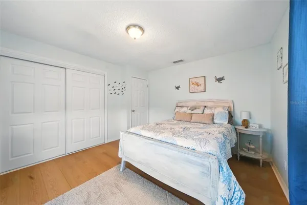 a room with a bed and a closet