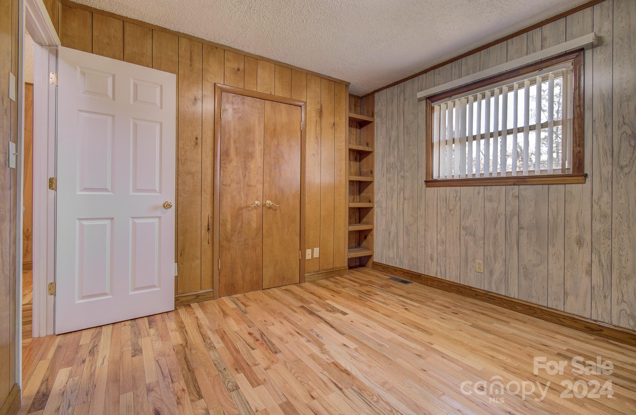 111 Souther Road Fletcher, NC 28732 - Photo 21 of 31 wooden floor and windows in a room