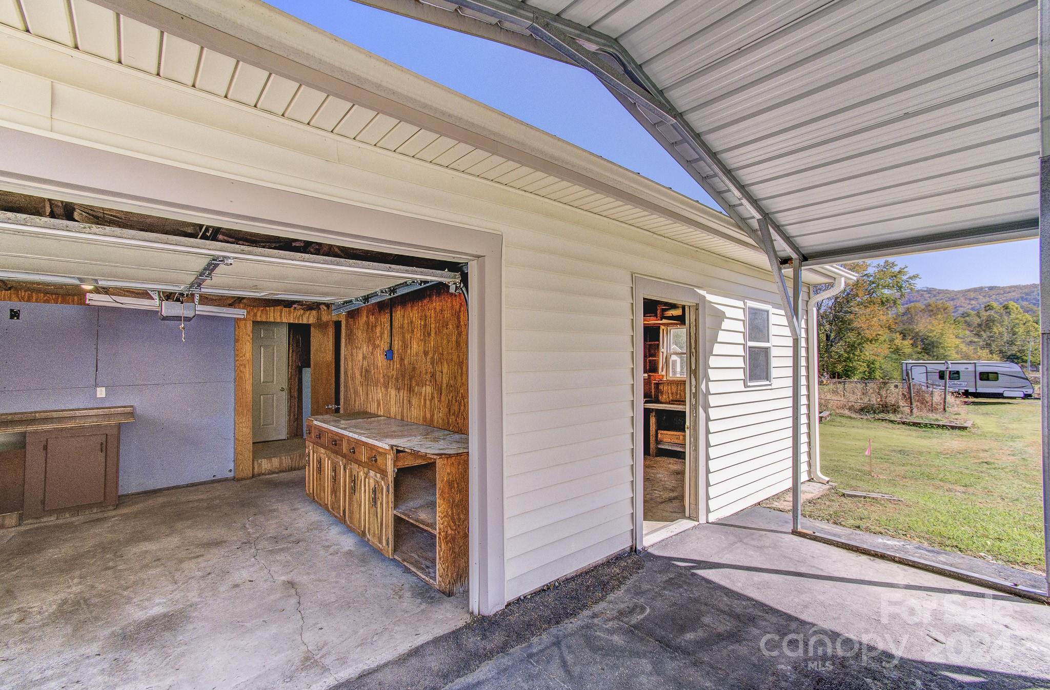 111 Souther Road Fletcher, NC 28732 - Photo 22 of 31 a view of a room with wooden walls