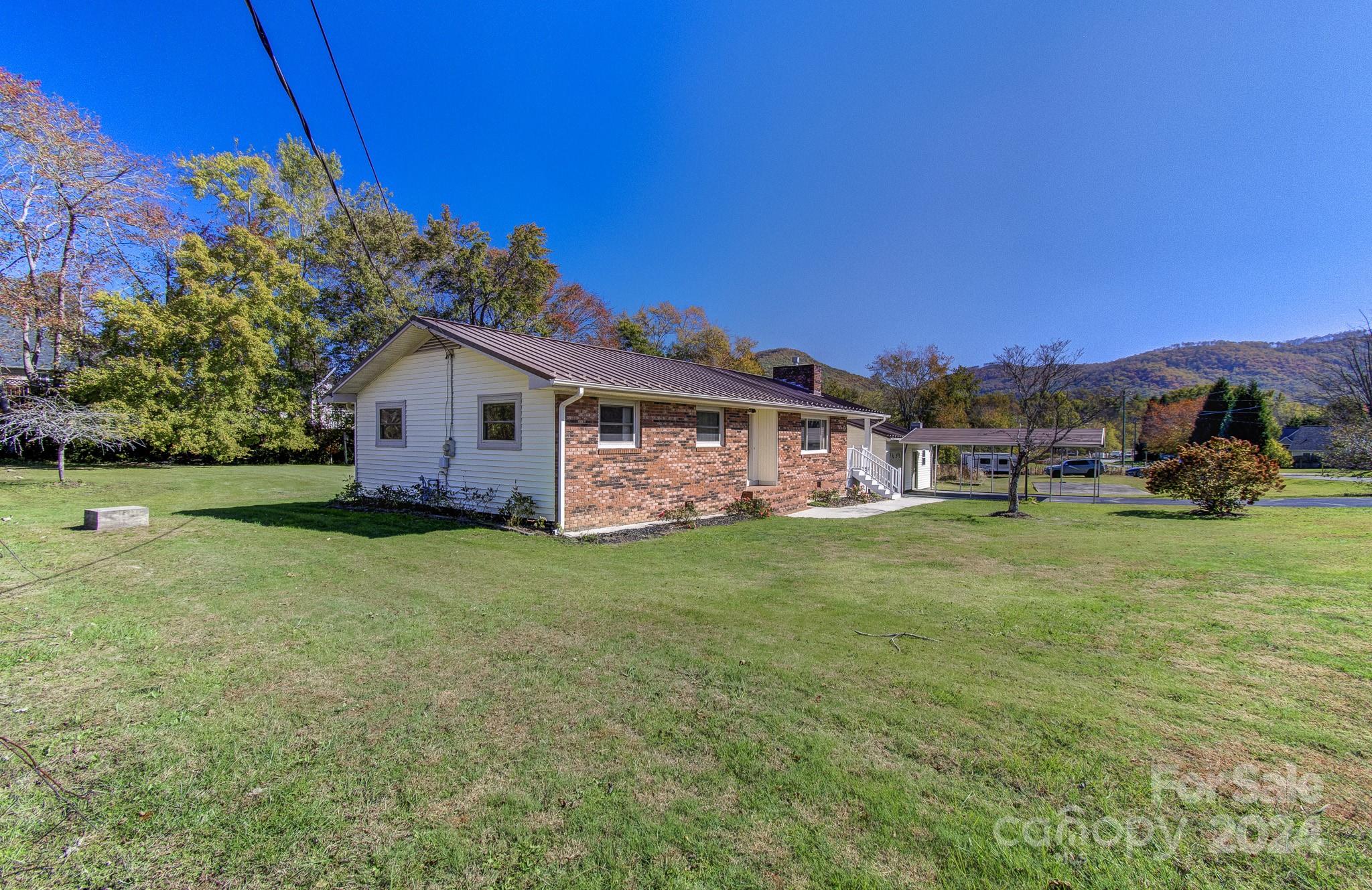 111 Souther Road Fletcher, NC 28732 - Photo 27 of 31 a view of a house with a big yard