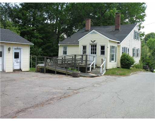 Exterior Back. Drive & Main Entrance...