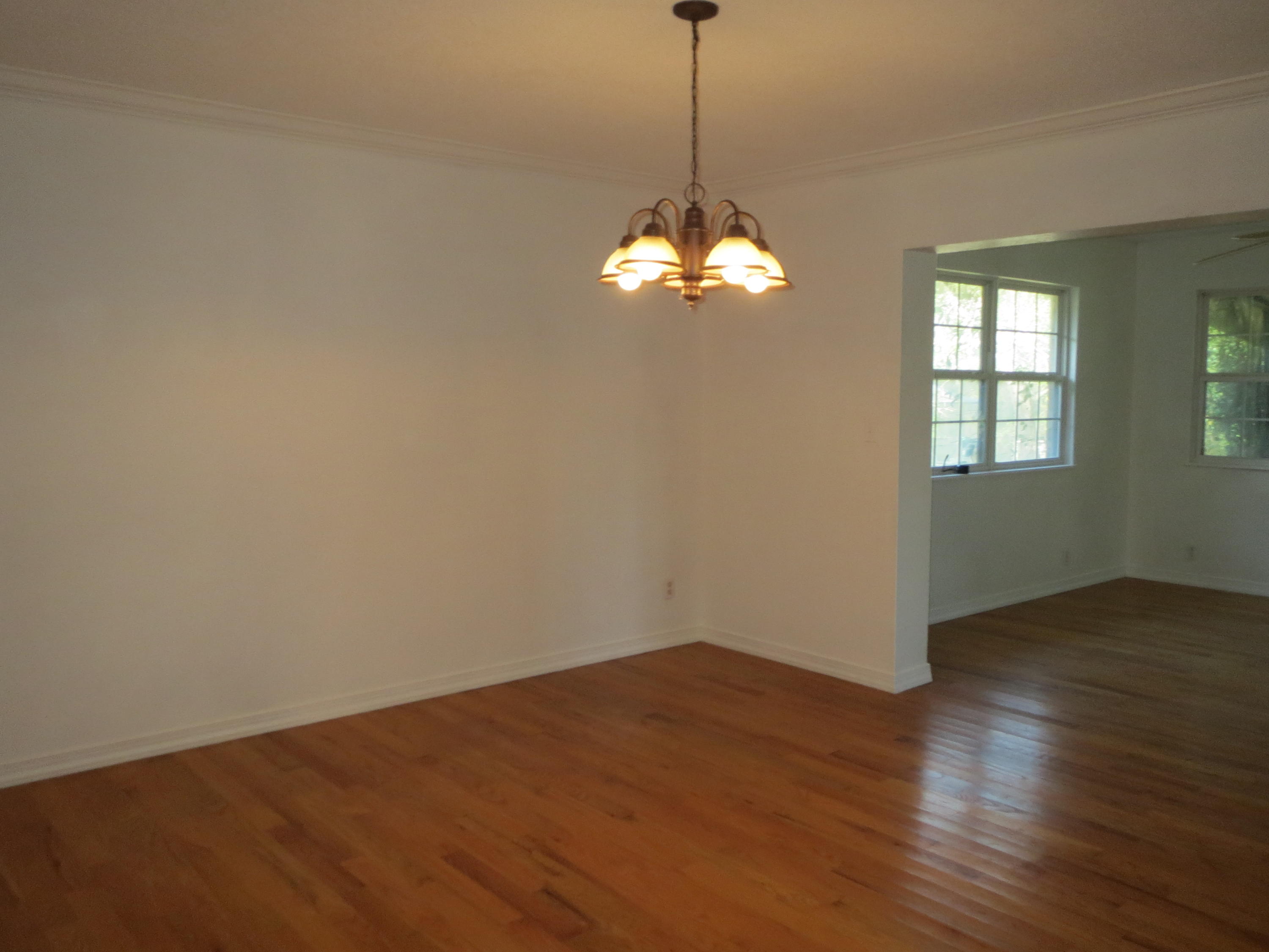 932 Tri County Road Graceville, FL 32440 - Photo 6 of 40 a view of a chandelier in a room